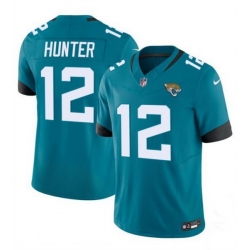 Youth Jacksonville Jaguars 12 Travis Hunter Teal 2025 Draft F U S E  Vapor Limited Stitched Football Jersey